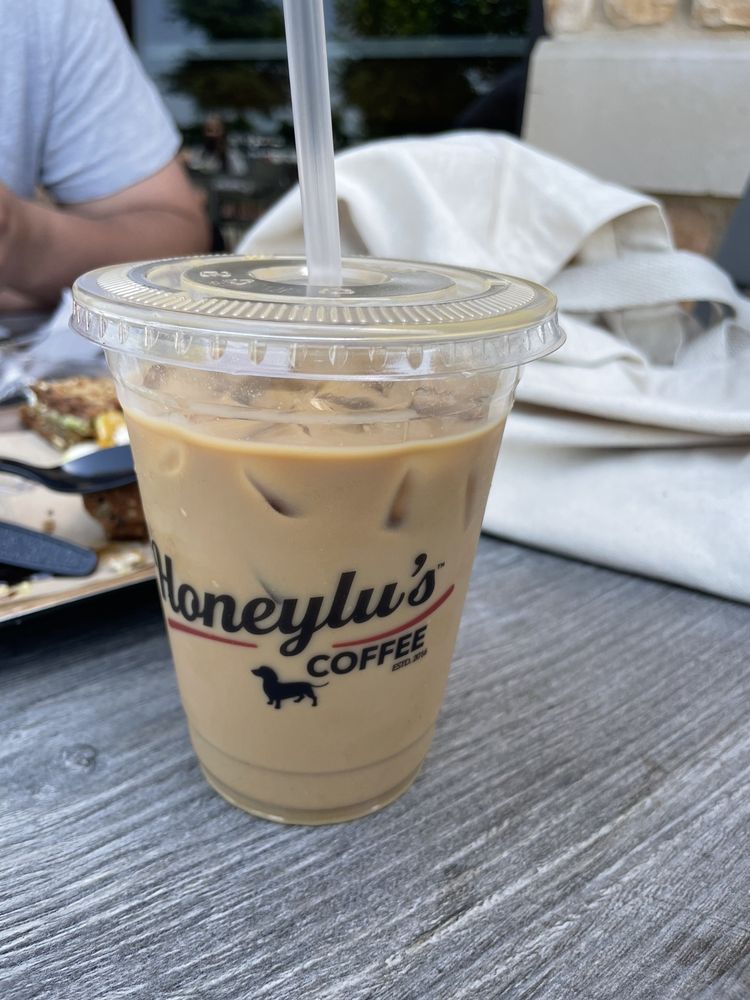 Vanilla Iced Latte with honeylu's syrup and oat milk